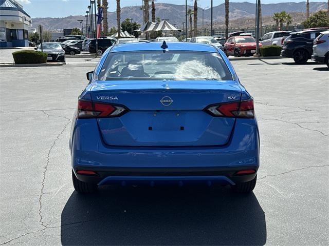 Photo of 2023 Electric Blue Metallic Nissan Versa