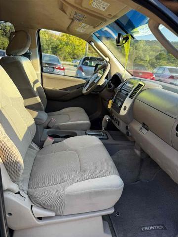 Photo of 2011 Super Black Nissan Frontier