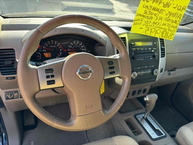 Photo of 2011 Super Black Nissan Frontier