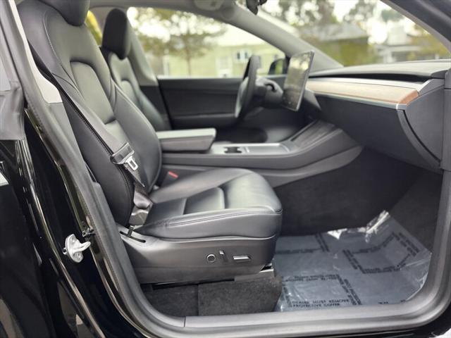 Photo of 2021 Solid Black Tesla Model Y