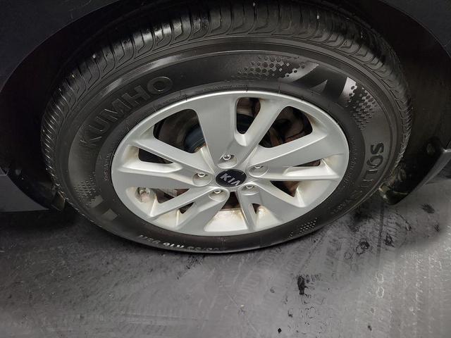 Photo of 2016 Ebony Black Kia Optima