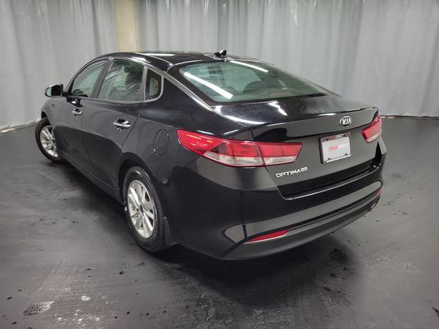 Photo of 2016 Ebony Black Kia Optima