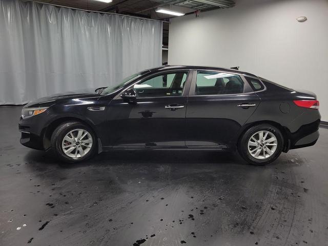 Photo of 2016 Ebony Black Kia Optima
