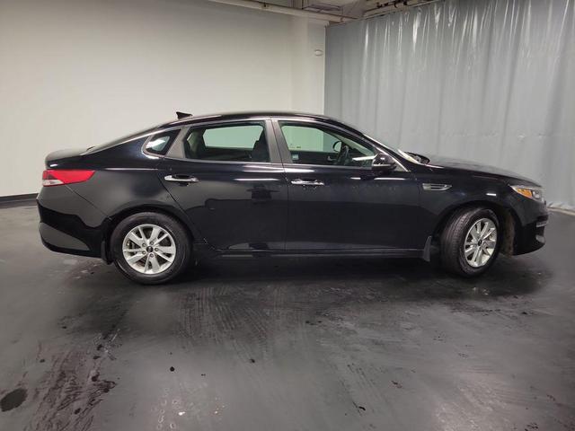 Photo of 2016 Ebony Black Kia Optima