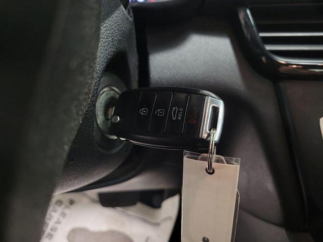 Photo of 2016 Ebony Black Kia Optima