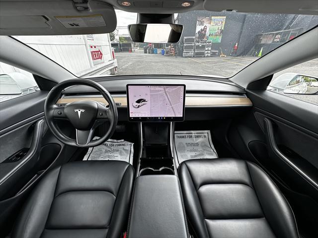 Photo of 2018 Pearl White Multi-Coat Tesla Model 3