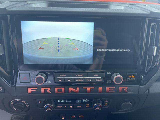 Photo of 2025 Afterburn Orange Nissan Frontier