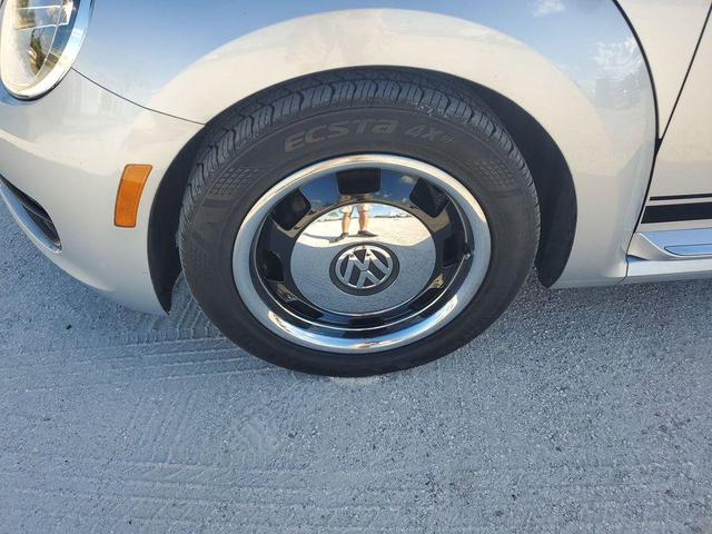 Photo of 2014 Reflex Silver Metallic Volkswagen Beetle