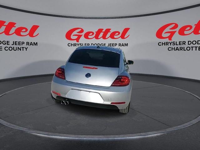 Photo of 2014 Reflex Silver Metallic Volkswagen Beetle