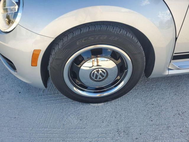 Photo of 2014 Reflex Silver Metallic Volkswagen Beetle
