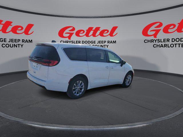 Photo of 2025 Bright White Clearcoat Chrysler Pacifica