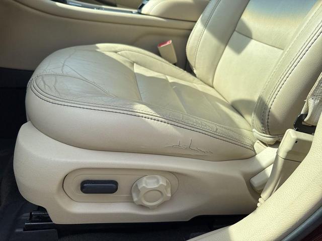 Photo of 2015 Ruby Red Metallic Tinted Clearcoat Ford Taurus