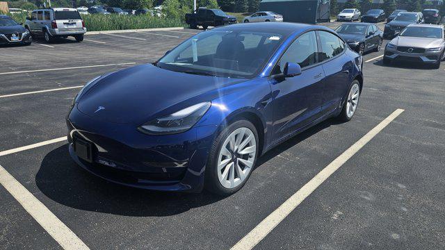 Photo of 2022 Deep Blue Metallic Tesla Model 3