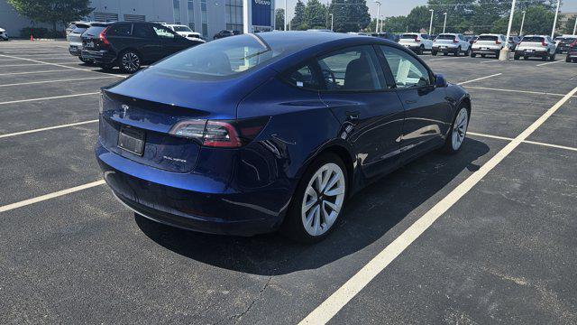 Photo of 2022 Deep Blue Metallic Tesla Model 3