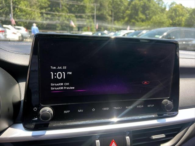 Photo of 2023 Fire Orange Kia Forte