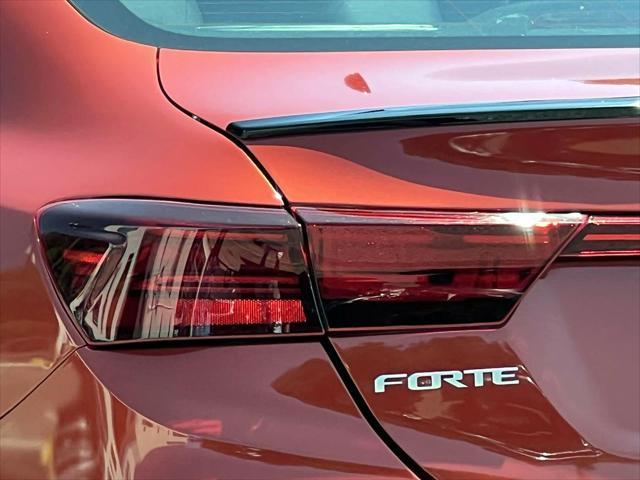 Photo of 2023 Fire Orange Kia Forte