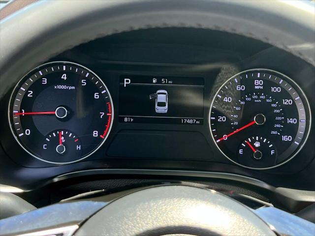 Photo of 2023 Fire Orange Kia Forte