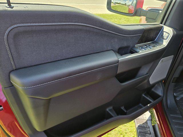 Photo of 2025 Ruby Red Metallic Tinted Clearcoat Ford F-350