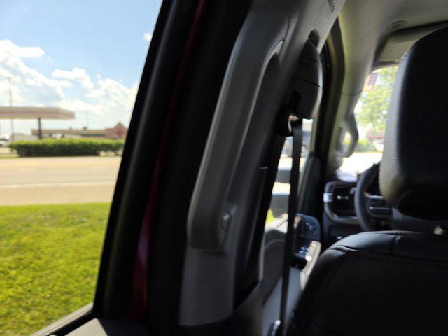 Photo of 2025 Ruby Red Metallic Tinted Clearcoat Ford F-350