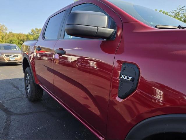Photo of 2025 Ruby Red Metallic Tinted Clearcoat Ford Ranger
