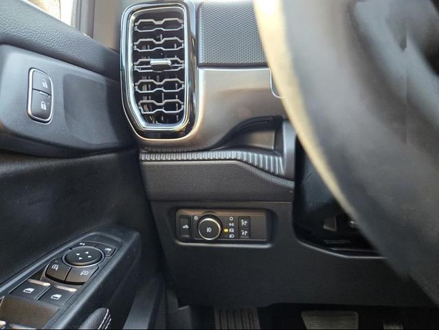 Photo of 2025 Ruby Red Metallic Tinted Clearcoat Ford Ranger