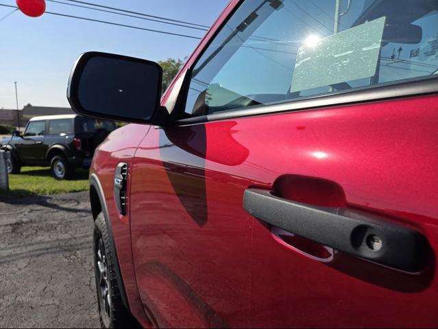 Photo of 2025 Ruby Red Metallic Tinted Clearcoat Ford Ranger