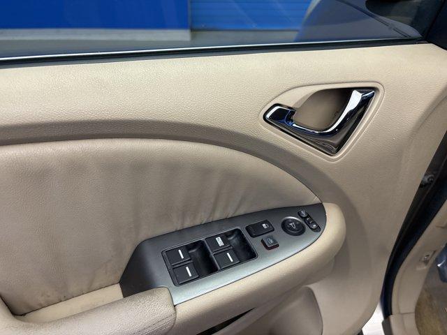 Photo of 2006 Desert Rock Metallic Honda Odyssey