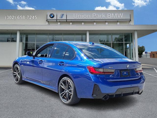 Photo of 2023 Portimao Blue Metallic BMW 330e