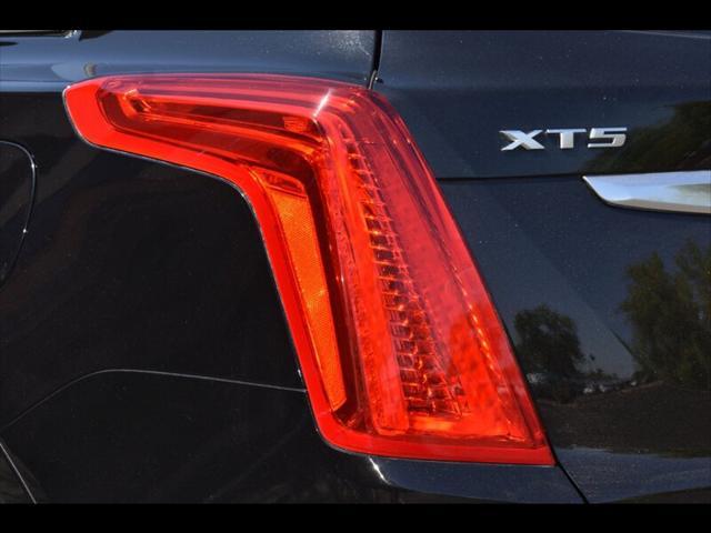 Photo of 2018 Stellar Black Metallic Cadillac XT5