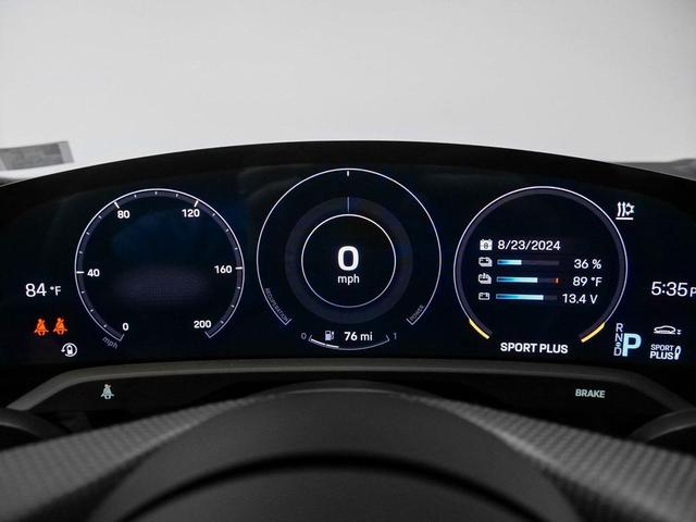 Photo of 2024 Jet Black Metallic Porsche Taycan