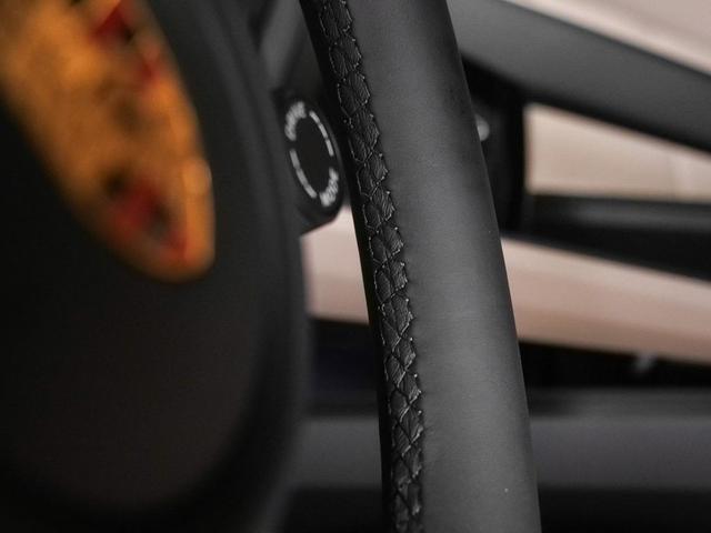 Photo of 2024 Copper Ruby Metallic Porsche Macan
