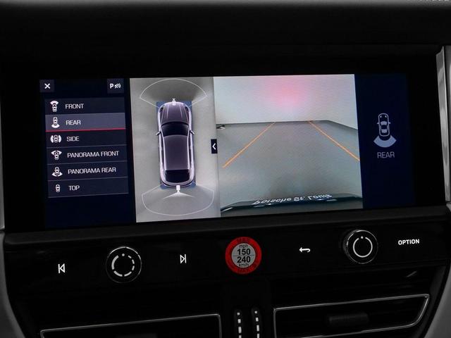 Photo of 2025 Copper Ruby Metallic Porsche Macan
