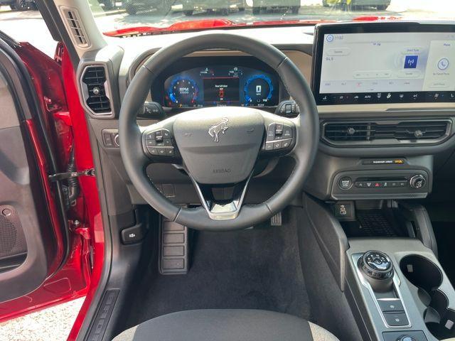 Photo of 2025 Ruby Red Metallic Tinted Clearcoat Ford Bronco Sport