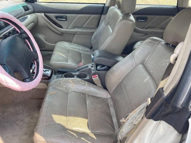 Photo of 2002 Off White Subaru Outback