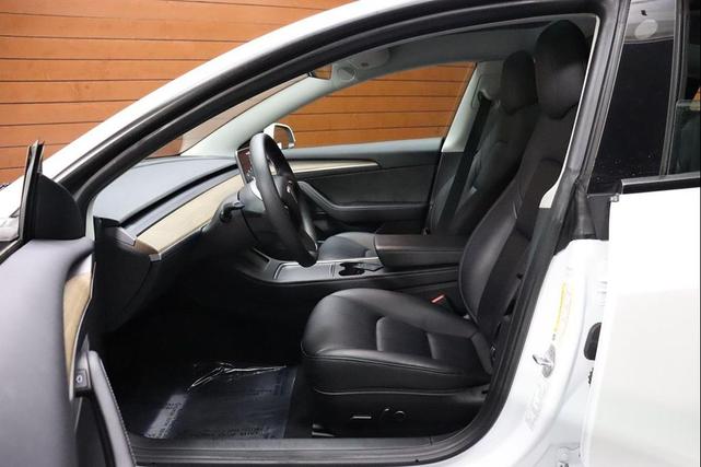 Photo of 2022 Pearl White Multi-Coat Tesla Model 3
