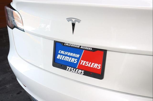 Photo of 2022 Pearl White Multi-Coat Tesla Model 3