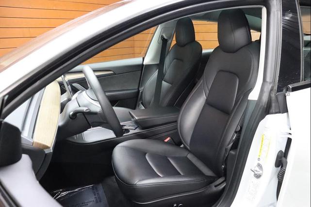 Photo of 2022 Pearl White Multi-Coat Tesla Model 3