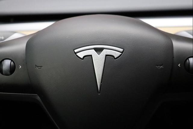 Photo of 2022 Pearl White Multi-Coat Tesla Model 3