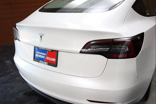 Photo of 2022 Pearl White Multi-Coat Tesla Model 3