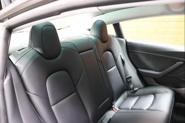 Photo of 2023 Solid Black Tesla Model 3