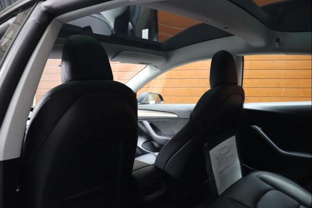 Photo of 2023 Solid Black Tesla Model 3
