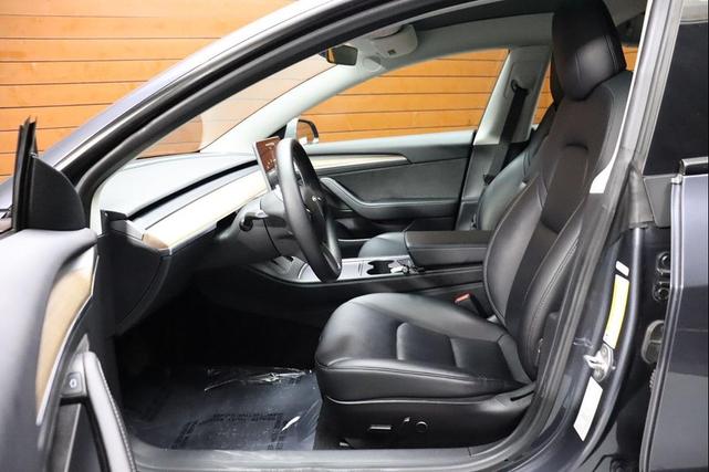 Photo of 2023 Solid Black Tesla Model 3