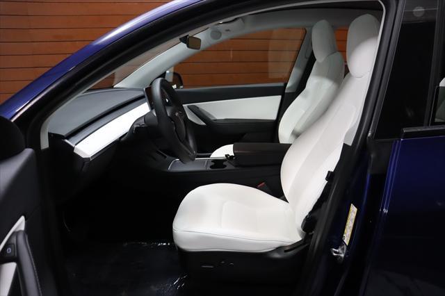 Photo of 2021 Deep Blue Metallic Tesla Model Y