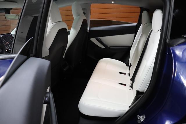 Photo of 2021 Deep Blue Metallic Tesla Model Y