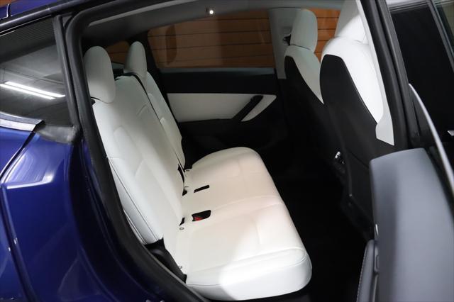 Photo of 2021 Deep Blue Metallic Tesla Model Y