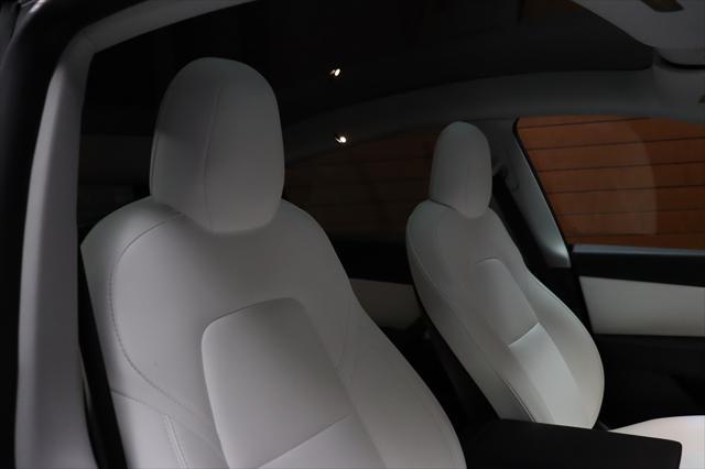 Photo of 2021 Deep Blue Metallic Tesla Model Y