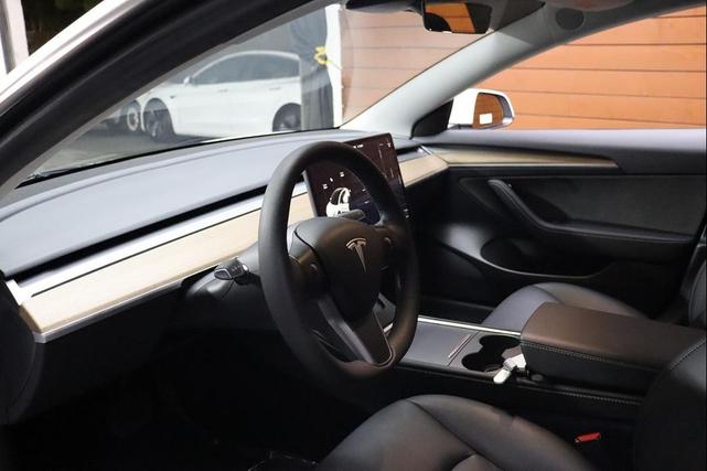 Photo of 2021 Pearl White Multi-Coat Tesla Model 3
