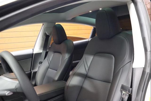 Photo of 2021 Pearl White Multi-Coat Tesla Model 3