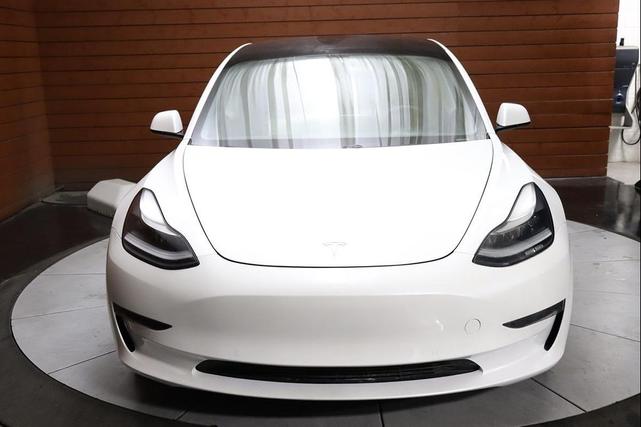 Photo of 2021 Pearl White Multi-Coat Tesla Model 3