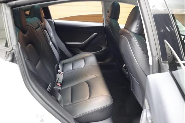 Photo of 2021 Pearl White Multi-Coat Tesla Model 3